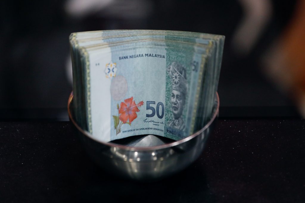 Malaysian Ringgit Rises to 13-Month High Amid Positive Growth and Market Confidence