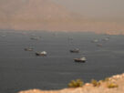Strait of Hormuz Escort Operations Paused After Commercial Ship Hit in Suspected Attack Near Oman