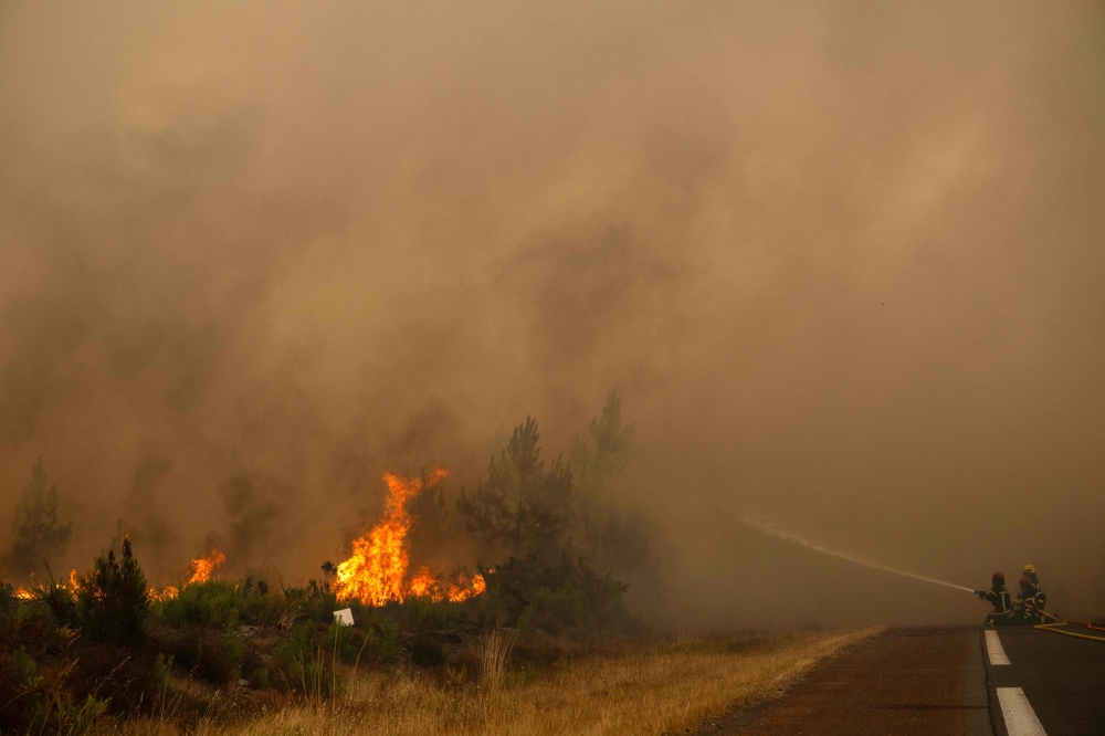 More than 300,000 evacuated as France and Spain battle devastating wildfires